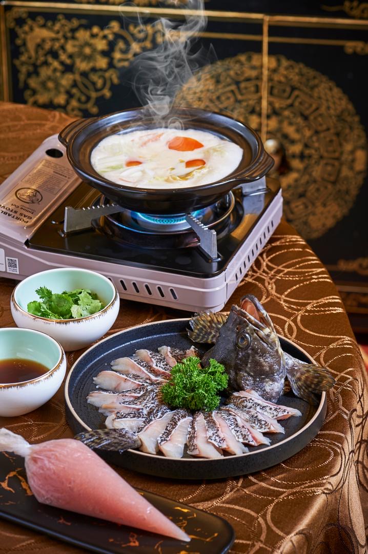 Live grouper sashimi with a steaming claypot of superior stock